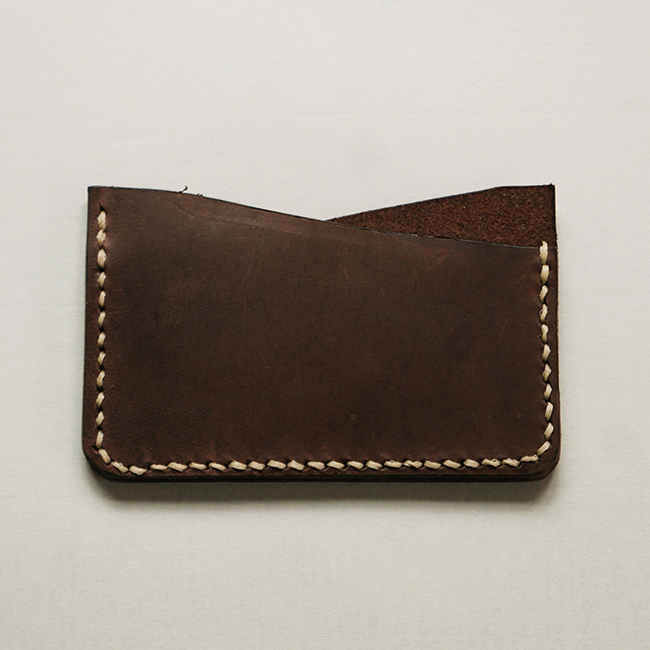 <h4><i>card wallet</i></h4>
					<h4><b>December 2018</b></h4>
					<h4>This card wallet is amongst the first leather projects I ever tried. I could really practice neat stitching and I gifted some of these to my friends that year.</h4>