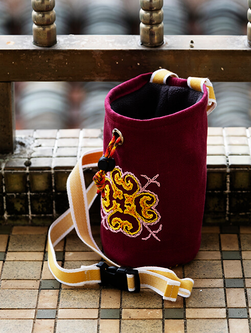 <h4><i>chalk bag</i></h4>
					<h4><b>August 2020</b></h4>
					<h4>I started climbing a few months ago and have so far gotten pretty into the sport. One piece of gear I've always been lacking is a chalk bag. I decided to make my own, something that reflects my style. I hand sewed traditional kazakh embroidery patterns on the side and bottom of the chalk bag, something I picked up from my trip to Mongolia. I'm really happy with how it turned out!</h4>