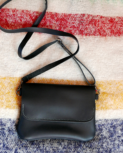 <h4><i>handbag</i></h4>
					<h4><b>December 2019 2020</b></h4>
					<h4>I made this handbag as a gift to my mom for Christmas. She had been asking me for a while to make her something out of leather, so I took up a trickier project that she would be able to use for a long time. It took 10 hours total of active work, and is one of my more ambitious leather projects. </h4>