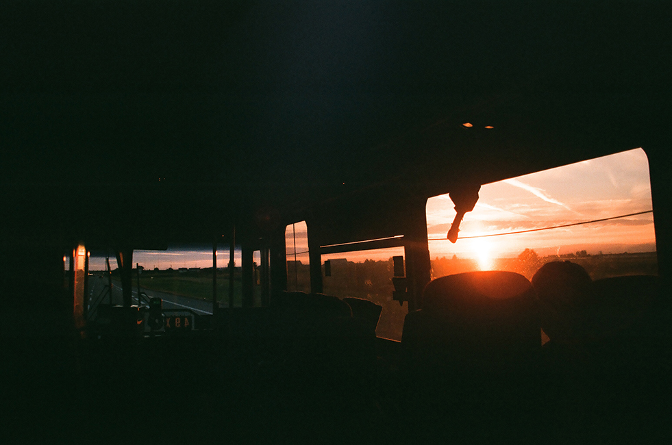 <h4><i>bus 351 westbound</i></h4>
					<h4><b> Vancouver, Canada <br> Nikon FM2 [35mm] <br> July 2017 </b></h4>
					<h4> This was taken on the bus from White Rock to Vancouver, after visiting my grandparents before returning to the city. It must’ve been almost 9pm, still bright in the middle of summer. A sunset over a long stretch of highway has to be one of my favorite and most nostalgic sights, not something you would see regularly in Hong Kong. </h4>