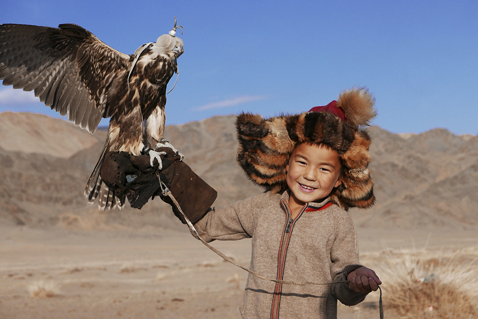 <h4><i>sanka and the falcon</i></h4>
					<h4><b> Sogoog, Mongolia <br> Lumix LX100 <br> October 2018 </b></h4>
					<h4> Sanka is the youngest of the second host family I stayed with. After a 6km walk for what felt like ages, we arrived at their uncle’s house. I got to hold their falcon and eagle they use to hunt, an ancient tradition practiced throughout West Mongolia. </h4>