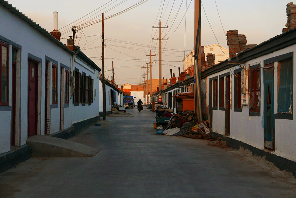 <h4><b> Erenhot, Inner Mongolia <br> Lumix LX100 <br> October 2018 </b></h4>
					<h4> Erenhot is the border town after the train ride from Mongolia into China. It was a desolate place during the off-season period I visited. The empty alleys and large streets made for an interesting place to explore. </h4>